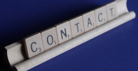 contact in scrabble letters