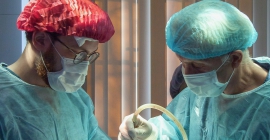 two surgeons in surgery